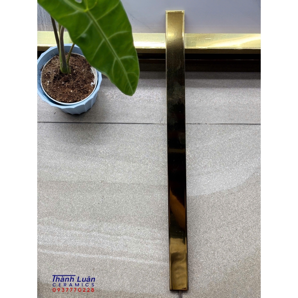 Gạch đường chỉ vàng trơn 4x60