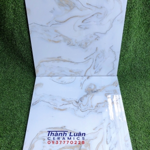 Gạch 60x60 khắc kim vàng trắng vân đá nhập khẩu