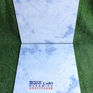 Gạch nhập khẩu 60x60 vân xanh khắc kim vàng 