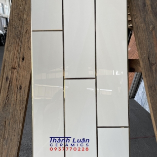 Gạch 30x60 bóng kiếng trắng khắc kim