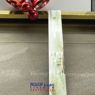 Gạch viền 7x60 lượn sóng in hoa xanh